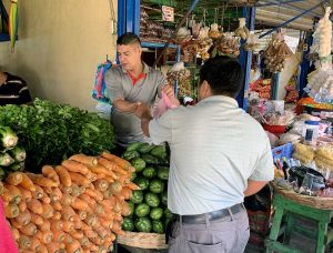 Buying vegetables at the outdoor market in Esteli