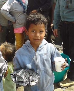 A young boy with the lunch given by Spanish School Nicaragua (Charity) 